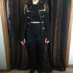 Vest, black cropped long sleeve, jazz pants, boots